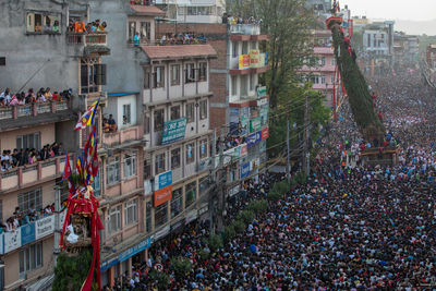 Devotees pull chariots as they take part in the festivities to mark the rato machindranath chariot.