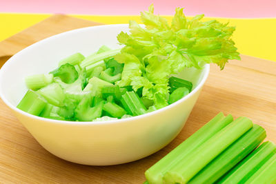High angle view of chopped vegetables in bowl on table
