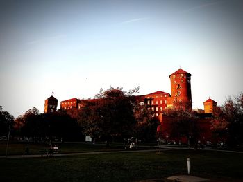 Buildings against sky during sunset