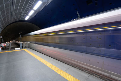 Blurred motion of train at subway station