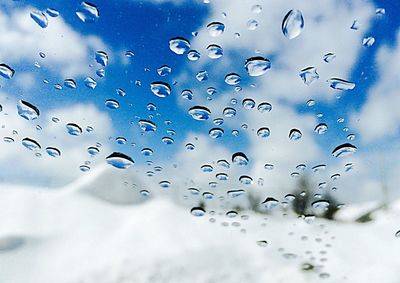 Close-up of water drops on glass