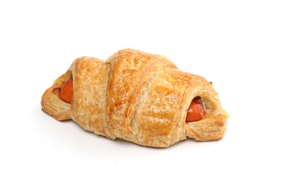 Close-up of bread against white background