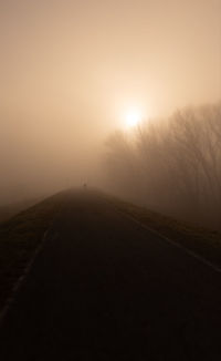 Scenic view of landscape against sky during sunset