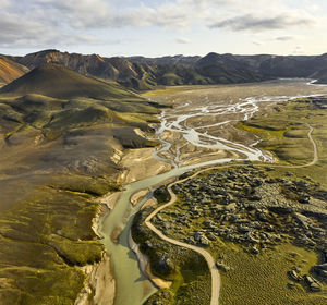 Road and wetland near hills