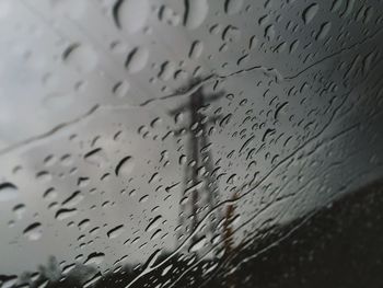 Close-up of water drops on glass