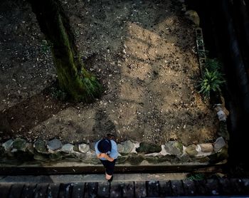 Woman standing on rock