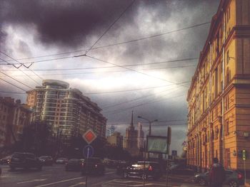 City street against cloudy sky