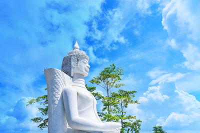 Low angle view of statue against sky