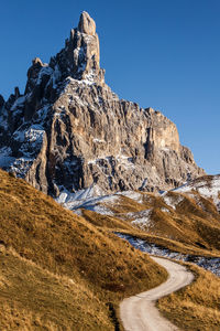 Scenic view of mountain against clear blue sky