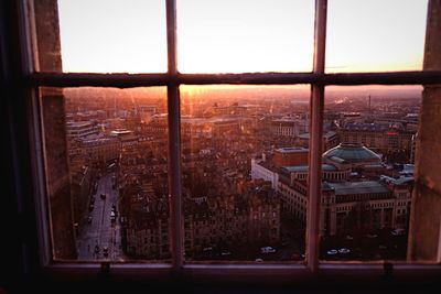 Cityscape seen through window