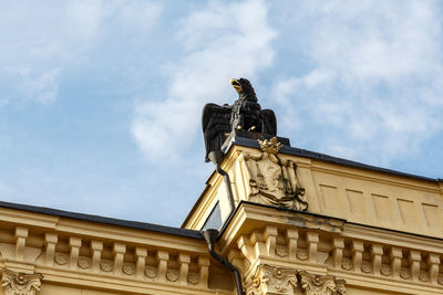 Low angle view of statue against sky