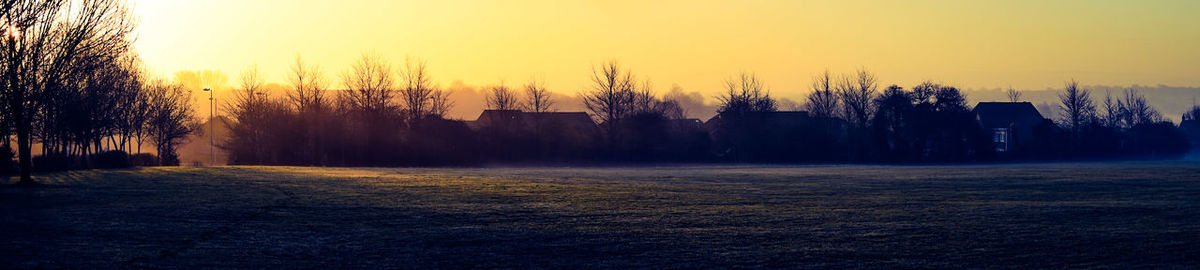 Scenic view of landscape at sunset