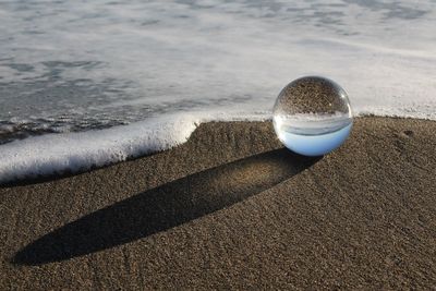 Coffee cup on beach