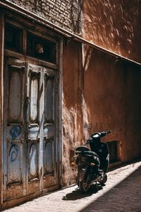 Side view of man riding motorcycle