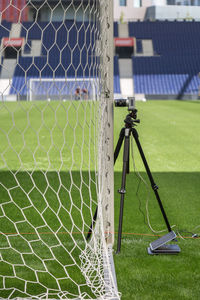 Soccer field seen through fence