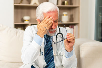 Doctor examining patient in hospital