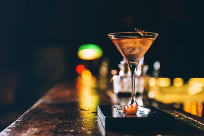 Close-up of drink in glass on table at bar