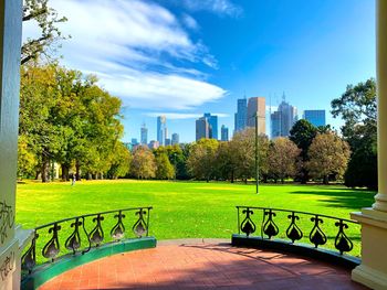 Park in city against sky