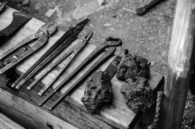 High angle view of blacksmiths tool on table