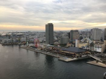 Cityscape against sky during sunset