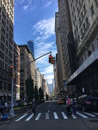 People walking on road in city