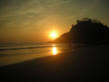 Scenic view of beach during sunset