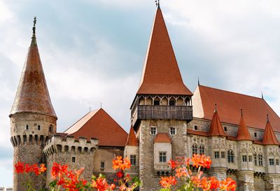 Low angle view of medieval castle building against sky