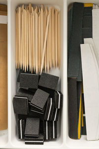 High angle view of make-up brushes on table