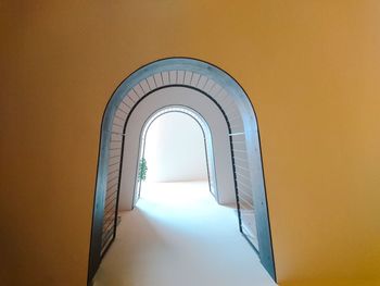 Corridor of building against clear sky