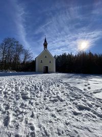 White building against sky during winter