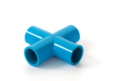 Close-up of blue toy against white background