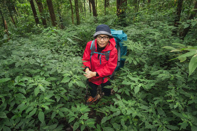 Man standing in forest