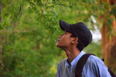 Portrait of young man looking away