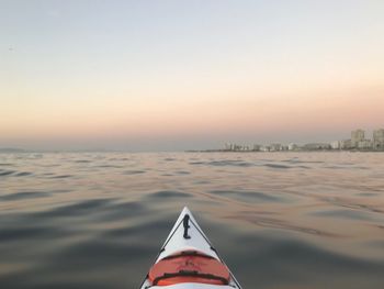 Scenic view of sea against clear sky during sunset