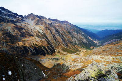 Scenic view of majestic mountains against sky