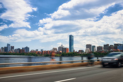 City by buildings against sky