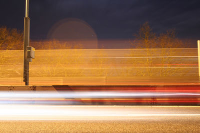 Light trails on road at night