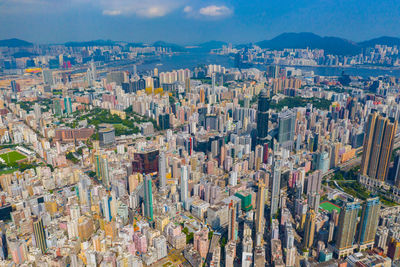 High angle view of crowd against buildings in city