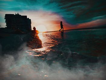 Scenic view of sea against sky during sunset