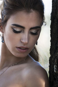 Close-up portrait of beautiful young woman