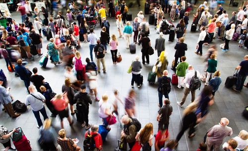 High angle view of people walking in city