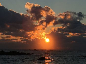 Scenic view of sea at sunset