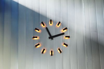 Close-up of illuminated clock
