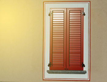 Close window with window shutters, italy style