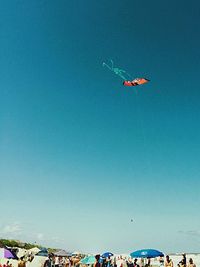 Airplane flying against clear sky