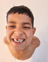 Close-up portrait of smiling boy