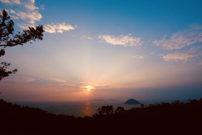 Scenic view of silhouette landscape against sky during sunset