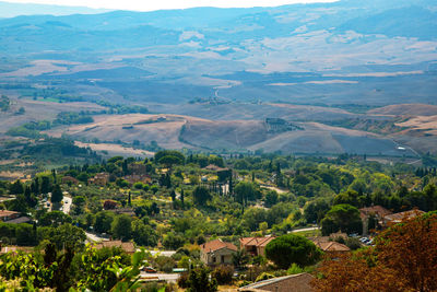 High angle view of townscape and mountains