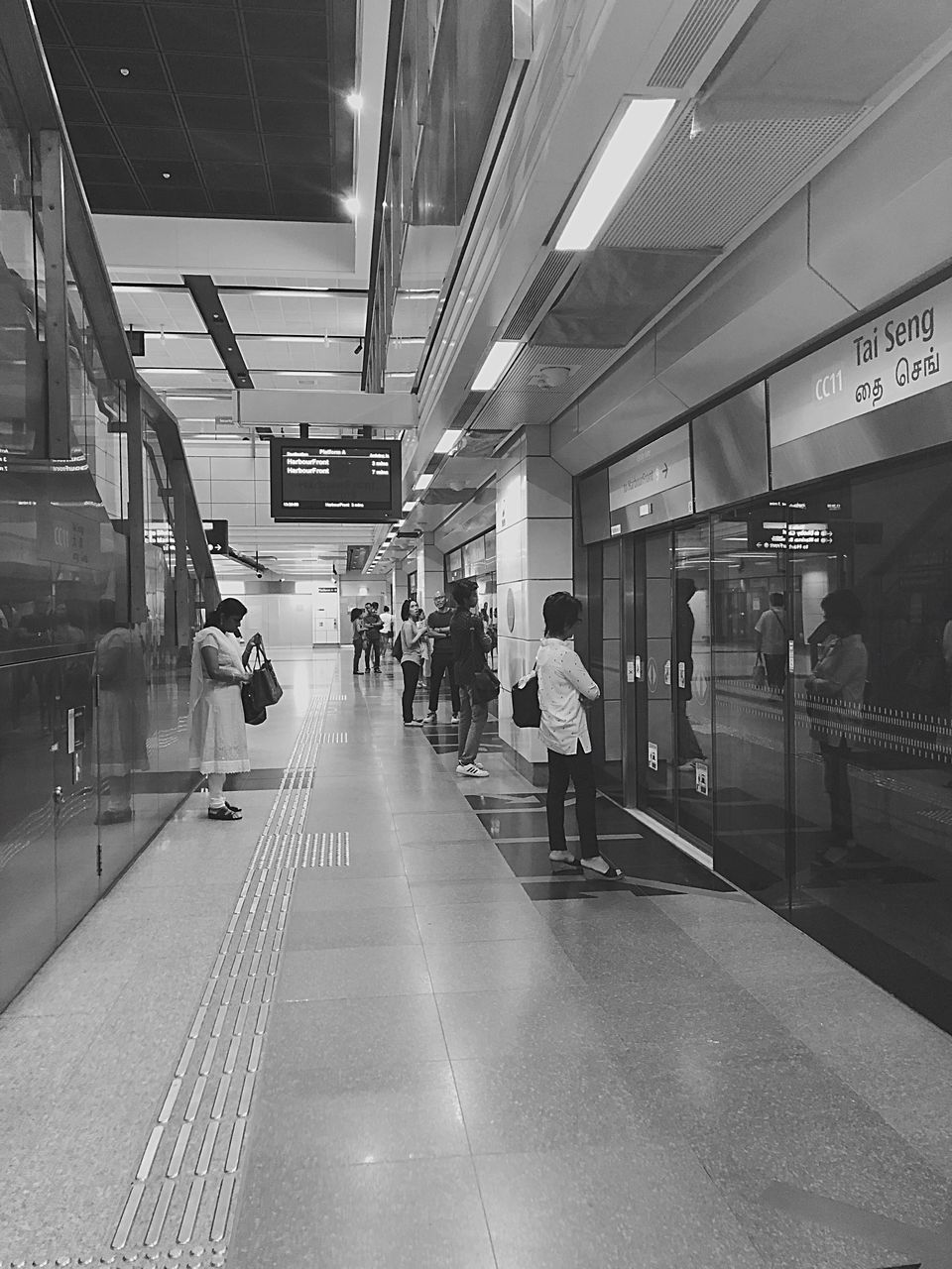 PEOPLE IN SUBWAY STATION