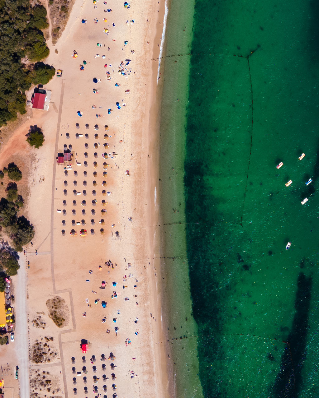 green, land, high angle view, water, nature, beach, aerial view, sports, day, sea, sand, outdoors, blue, travel, leisure activity, plant, lifestyles, group of people, travel destinations